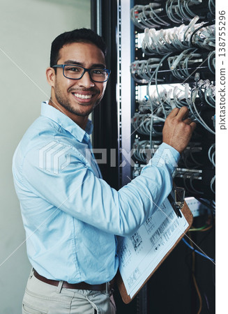 Happy man, portrait and IT technician with cables in mainframe for troubleshooting or connection. Male person, employee or network engineer with smile or clipboard for internet maintenance or control Happy man, portrait and IT technician with cables in mainframe for troubleshooting or connection. Male person, employee or network engineer with smile or clipboard for internet maintenance or control 138755296