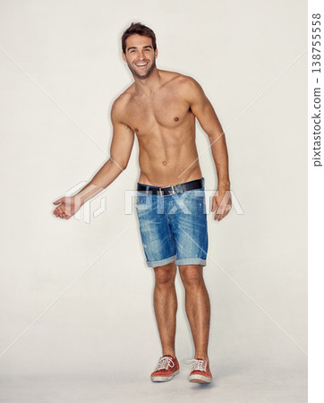 Smile, topless and portrait of man or model for fitness, sports or muscle on a studio background. Health, cool and a guy or person with abs or stomach from exercise, training or shorts on a backdrop Smile, topless and portrait of man or model for fitness, sports or muscle on a studio background. Health, cool and a guy or person with abs or stomach from exercise, training or shorts on a backdrop 138755558