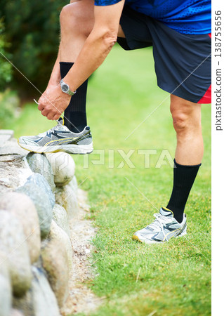 Fitness, tie or runner with shoes on rock by nature for exercise, training or outdoor workout. Hands, man or closeup of legs of athlete in park with sports footwear ready for jog, walking or wellness Fitness, tie or runner with shoes on rock by nature for exercise, training or outdoor workout. Hands, man or closeup of legs of athlete in park with sports footwear ready for jog, walking or wellness 138755656