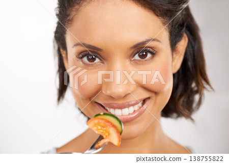 Happy woman, portrait and vegetable salad for diet, snack or natural nutrition against a studio background. Closeup of female person smile and eating organic food for fiber, vitamins or healthy meal 138755822