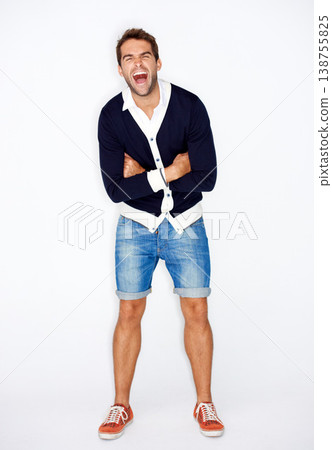 Portrait, fashion and a man in studio, shouting on a white background with his arms folded for style. Energy, passion and a confident young employee screaming or yelling in a trendy clothes outfit Portrait, fashion and a man in studio, shouting on a white background with his arms folded for style. Energy, passion and a confident young employee screaming or yelling in a trendy clothes outfit 138755825