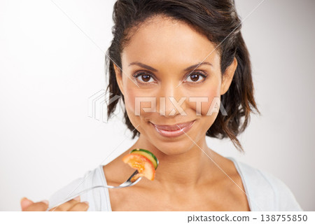 Happy woman, portrait and vegetables for diet, snack or natural nutrition against a studio background. Closeup of female person, face or smile with organic food for fiber, vitamins or healthy meal Happy woman, portrait and vegetables for diet, snack or natural nutrition against a studio background. Closeup of female person, face or smile with organic food for fiber, vitamins or healthy meal 138755850