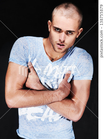 Portrait, fashion and man in tshirt with arms crossed in studio isolated on a black background. Face, serious and confidence of person with casual clothes, cool style and trendy model in Australia 138755879