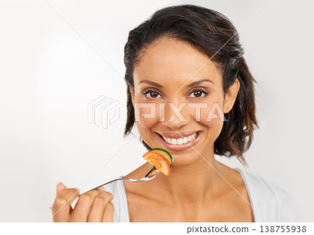 Happy woman, portrait and smile with vegetables for diet, snack or natural nutrition against a studio background. Face of female person or model with organic food for fiber, vitamins or healthy meal Happy woman, portrait and smile with vegetables for diet, snack or natural nutrition against a studio background. Face of female person or model with organic food for fiber, vitamins or healthy meal 138755938