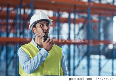 Man, radio and chat in warehouse for logistics, storage site and contact with safety inspection. Person, communication and wireless tech with conversation, helmet and shipping at distribution plant 138755942