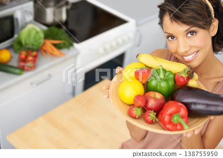 Portrait, space and vegetables with a woman in the kitchen of her home for nutrition, diet or meal preparation. Face, smile and a recipe for cooking healthy food with a young person in her apartment Portrait, space and vegetables with a woman in the kitchen of her home for nutrition, diet or meal preparation. Face, smile and a recipe for cooking healthy food with a young person in her apartment 138755950