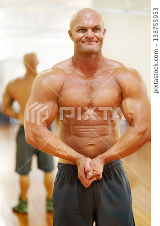 Man in gym, bodybuilder and muscle with flexing biceps, fitness and abs, training exercise and strong body challenge. Workout, health and wellness for bodybuilding, results and masculine with power Man in gym, bodybuilder and muscle with flexing biceps, fitness and abs, training exercise and strong body challenge. Workout, health and wellness for bodybuilding, results and masculine with power 138755953
