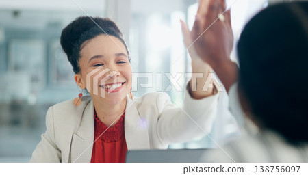 Business women, high five and happy in office with agreement, congratulations and work partnership. Employees, celebration and smile with respect, thank you and team building for goal in workplace Business women, high five and happy in office with agreement, congratulations and work partnership. Employees, celebration and smile with respect, thank you and team building for goal in workplace 138756097