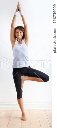 Fitness, stretching and yoga, portrait of happy woman in gym or exercise studio for health, wellness or training. Relax, warm up and smile, girl in standing workout for balance, body care and pilates Fitness, stretching and yoga, portrait of happy woman in gym or exercise studio for health, wellness or training. Relax, warm up and smile, girl in standing workout for balance, body care and pilates 138756099