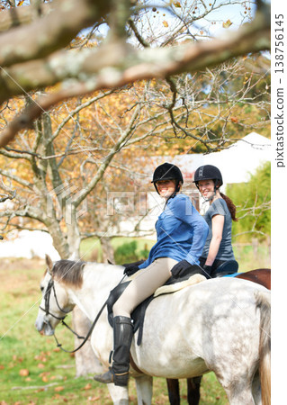 Portrait, friends or women horse riding in nature or countryside with rider or jockey for recreation. Happy, teamwork or equestrian with smile to start training, exercise or workout in ranch or farm Portrait, friends or women horse riding in nature or countryside with rider or jockey for recreation. Happy, teamwork or equestrian with smile to start training, exercise or workout in ranch or farm 138756145