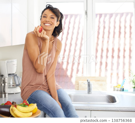 Smile, apple and young woman in her kitchen for wellness, nutrition and organic weight loss diet. Happy, vitamins and portrait of female person from Mexico eat fruit for healthy vegan snack at home. Smile, apple and young woman in her kitchen for wellness, nutrition and organic weight loss diet. Happy, vitamins and portrait of female person from Mexico eat fruit for healthy vegan snack at home. 138756368
