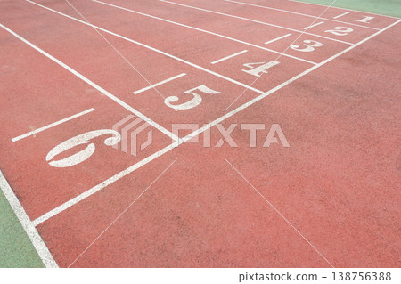a Red Running Track with White Lane Markings a Red Running Track with White Lane Markings 138756388