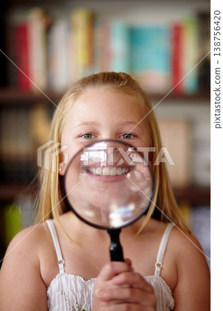 Portrait, library and child with a magnifying glass on her smile for education, inspection and studying. young, confident and a girl, kid or student with equipmwnt for a search or attention on mouth Portrait, library and child with a magnifying glass on her smile for education, inspection and studying. young, confident and a girl, kid or student with equipmwnt for a search or attention on mouth 138756420