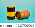 Two Empty Petroleum Drums on Blue Background 138756503