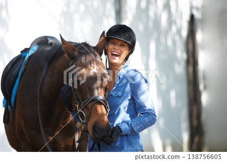Happy, portrait and a woman with a horse for sports, farm training and riding for hobby. Smile, adventure and young rider with an animal for equestrian exercise for competition or race in nature. Happy, portrait and a woman with a horse for sports, farm training and riding for hobby. Smile, adventure and young rider with an animal for equestrian exercise for competition or race in nature. 138756605