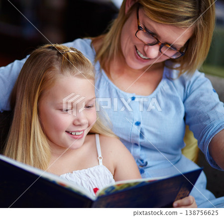 Reading, story and mother with child in home with smile, learning and relax with study knowledge. Storytelling, happy mom and girl on library couch together with books, fantasy and education. Reading, story and mother with child in home with smile, learning and relax with study knowledge. Storytelling, happy mom and girl on library couch together with books, fantasy and education. 138756625