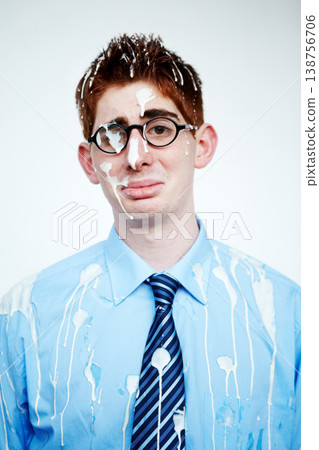 Portrait, bird poo and a business man in studio on a white background for an unlucky or misfortunate mishap. Sad, depression and bad luck with an unhappy young employee in glasses after an accident Portrait, bird poo and a business man in studio on a white background for an unlucky or misfortunate mishap. Sad, depression and bad luck with an unhappy young employee in glasses after an accident 138756706