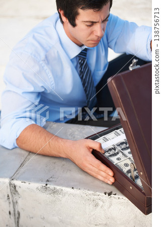 Businessman, person or briefcase with money or crime and corruption, thief or fraud outdoor for financial crisis. Professional, man or face with contemplation for cash, finance and secret with stress Businessman, person or briefcase with money or crime and corruption, thief or fraud outdoor for financial crisis. Professional, man or face with contemplation for cash, finance and secret with stress 138756713