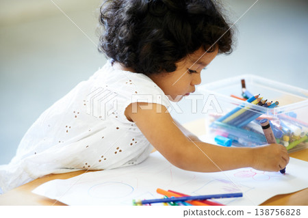 Drawing, school and a child with paper for art, education or creativity in kindergarten. Psychology, development and a girl, kid or student writing with a picture in a creative classroom at preschool Drawing, school and a child with paper for art, education or creativity in kindergarten. Psychology, development and a girl, kid or student writing with a picture in a creative classroom at preschool 138756828