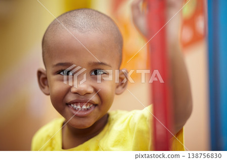 African boy, portrait and smile in classroom at kindergarten with pride for development, scholarship or learning. Child, student and face at school, happy and education for future, growth or academy African boy, portrait and smile in classroom at kindergarten with pride for development, scholarship or learning. Child, student and face at school, happy and education for future, growth or academy 138756830