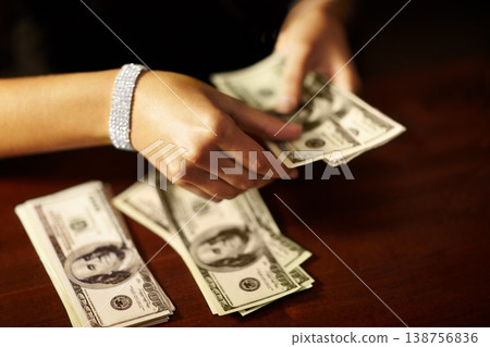 Woman, hand and count dollar money for rich winning, cash deal or secret wealth fraud. Female person, jewellery or crime banking scam or finance for pay profit bribe, exchange or illegal bills notes Woman, hand and count dollar money for rich winning, cash deal or secret wealth fraud. Female person, jewellery or crime banking scam or finance for pay profit bribe, exchange or illegal bills notes 138756836