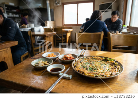 Korean Chive Pancake with Kimchi and Side Dishes Restaurant Scene 138758230
