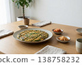Korean Chive Pancake with Side Dishes on Wooden Table 138758232