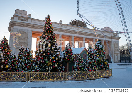 Christmas tree and New Year decorations on the town square on a frosty winter day. 138758472