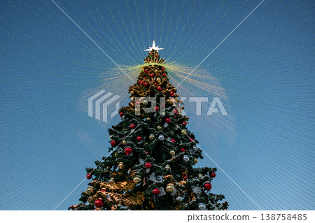 Christmas tree and New Year decorations on the town square on a frosty winter day. 138758485