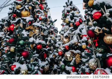 Christmas tree and New Year decorations on the town square on a frosty winter day. 138758489