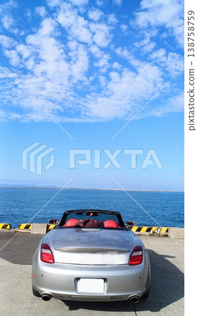 Autumn sky, the sea, and a convertible Autumn sky, the sea, and a convertible 138758759