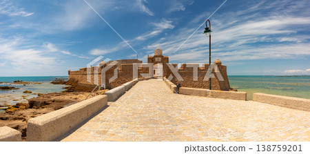 San Sebastian fortress entrance over Atlantic shore in Cadiz, Spain San Sebastian fortress entrance over Atlantic shore in Cadiz, Spain 138759201
