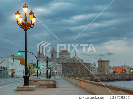 Cadiz waterfront promenade with cathedral at blue hour, Andalusia, Spain Cadiz waterfront promenade with cathedral at blue hour, Andalusia, Spain 138759265
