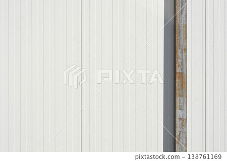 White Corrugated Metal Wall with Rusty Steel Beam 138761169