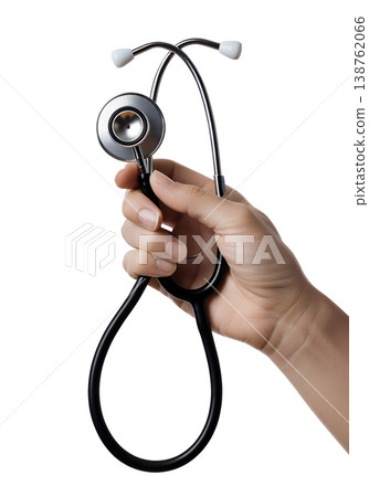 Hand holding a classic dual-head medical stethoscope with a silver chest piece and black tubing, representing auscultation and patient assessment 138762066