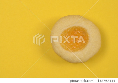 Lemon Curd Cookie on Yellow Background Lemon Curd Cookie on Yellow Background 138762344