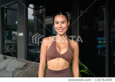 Portrait of Radiant Thai Fitness Model in Brown Halter Set Gym Training Done Concept Portrait of Radiant Thai Fitness Model in Brown Halter Set Gym Training Done Concept 138762885