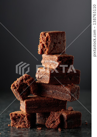 Brownie on a black stone table. 138763110
