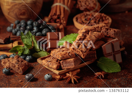 Brownie with blueberries and mint. 138763112