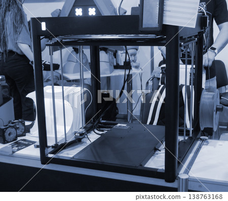 3D printer. 3D printer with blank work surface. Empty 3D printer. Modern new additive progressive technologies. 3D printing three-dimensional technology. Printing modeling manufacturing technology 138763168
