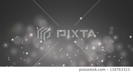 Soft glowing bokeh light effect with sparkling white particles creating a magical overlay 138763323