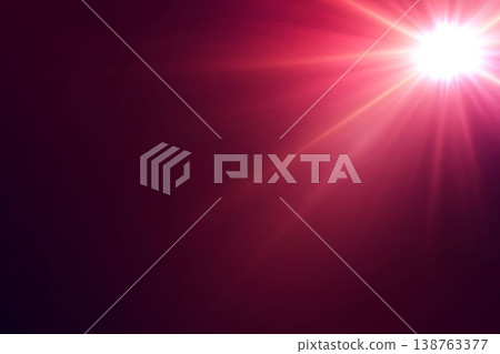 Bright abstract light rays creating lens flare effect on dark magenta background 138763377