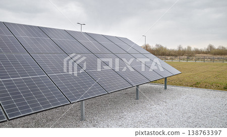 Photo of photovoltaic panels on a cloudy day. Photo of photovoltaic panels on a cloudy day. 138763397
