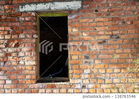 Abandoned threshold with sunlight. Old brick gateway inviting curiosity amid decay and light Abandoned threshold with sunlight. Old brick gateway inviting curiosity amid decay and light 138763546
