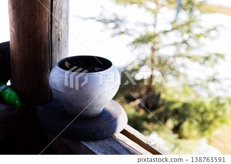Tranquil setting featuring aged ceramics and soft sunlight in garden environment Tranquil setting featuring aged ceramics and soft sunlight in garden environment 138763591