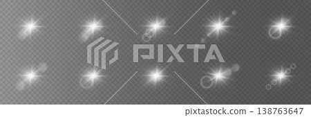 Set of white glowing lens flares and light effects creating a graphic overlay Set of white glowing lens flares and light effects creating a graphic overlay 138763647