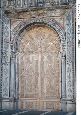Artistic Marble Doorway Featuring Elaborate Arch And Traditional Craftsmanship Details Artistic Marble Doorway Featuring Elaborate Arch And Traditional Craftsmanship Details 138763864
