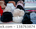 Soft Pastel Fur Hats Showcased. Arranged Cozy Fur Hats In Pastel Shades With Price Tags Attached 138763874