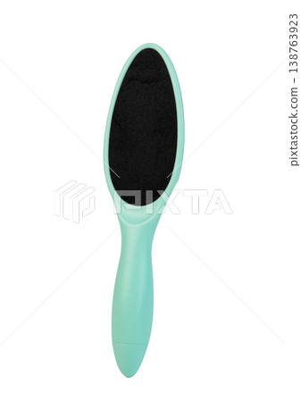 Professional turquoise foot rasp with black abrasive surface isolated on white background, pedicure tool. 138763923