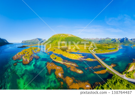 Aerial drone view of a scenic road and bridge in Lofoten islands, Norway. 138764487